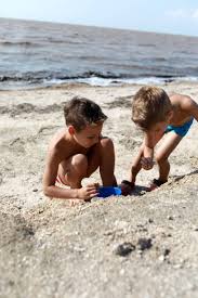 Boys On Beach Of Sea Of Azov Stock Photo - Download Image Now - Activity,  Beach, Brother - iStock