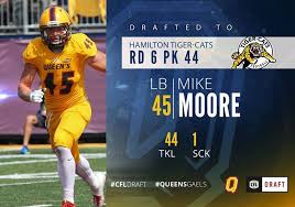 DRAFTED!!! Mike Moore is selected in the 6th round 44th overall by ...
